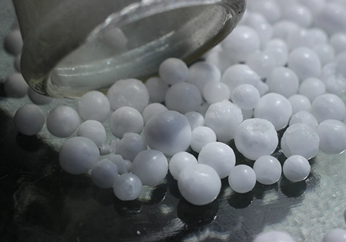Spherical ammonium nitrate poured from a test tube, a popular nitrogen fertilizer in agriculture and a powerful oxidizing agent in pyrotechnics. Explosives testing, Testing explosives, Explosives analysis, Detection of explosives