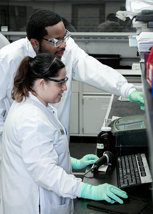 Pace Scientists working in laboratory. TPH testing, petroleum hydrocarbon, total petroleum, TPH analysis, total petroleum hydrocarbon